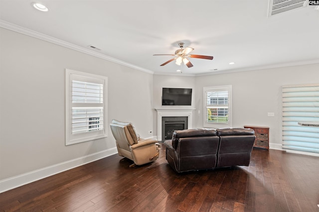 126 Sunset Bay Ln, Lexington, SC 29072 - living room featuring ornamental molding, visible vents, a ceiling fan, and a fireplace