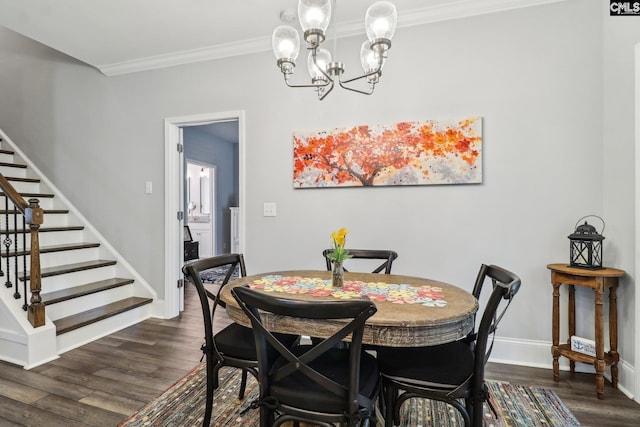 dining space with crown molding, dark wood-type flooring, stairs, a notable chandelier, and baseboards