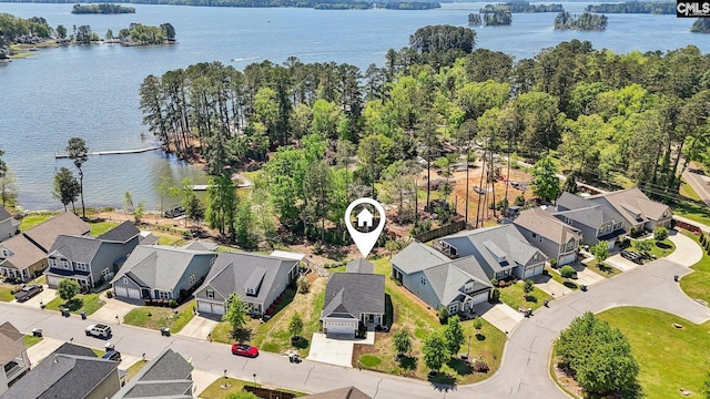 aerial view featuring a water view and a residential view