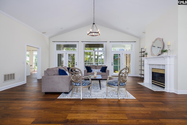 1168 Peninsula Dr, Prosperity, SC 29127 - living area featuring a fireplace, wood finished floors, visible vents, and french doors