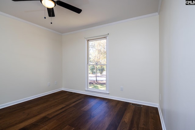 1168 Peninsula Dr, Prosperity, SC 29127 - spare room featuring baseboards, visible vents, ornamental molding, and dark wood-style flooring
