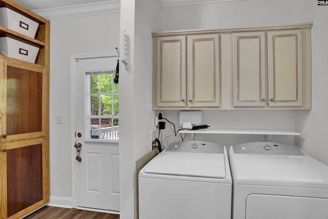 107 Turkey Ridge Ln, Lugoff, SC 29078 - washroom with wood finished floors, washer and dryer, ornamental molding, and cabinet space