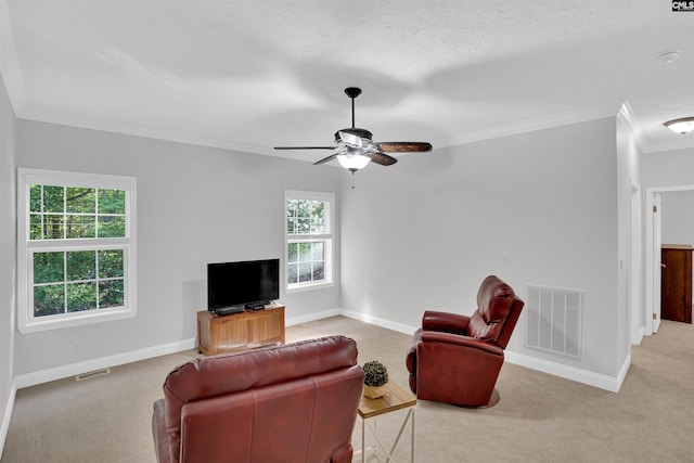 107 Turkey Ridge Ln, Lugoff, SC 29078 - carpeted living area with baseboards, visible vents, ceiling fan, and crown molding