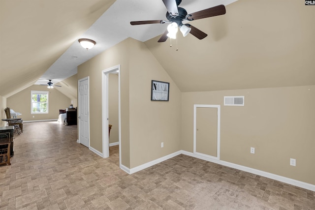 107 Turkey Ridge Ln, Lugoff, SC 29078 - additional living space with lofted ceiling, a ceiling fan, visible vents, and baseboards