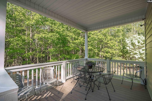 107 Turkey Ridge Ln, Lugoff, SC 29078 - deck with outdoor dining space and a forest view
