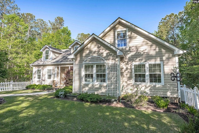107 Turkey Ridge Ln, Lugoff, SC 29078 - view of front of house with fence and a front lawn