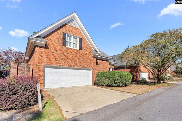 411 Turkey Point Cir, Columbia, SC 29223 - view of front of home with an attached garage, brick siding, and concrete driveway