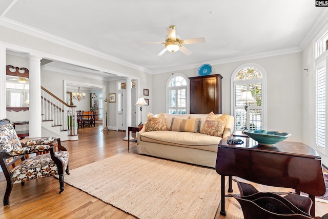 411 Turkey Point Cir, Columbia, SC 29223 - living area featuring light wood-style flooring, ornate columns, and a healthy amount of sunlight