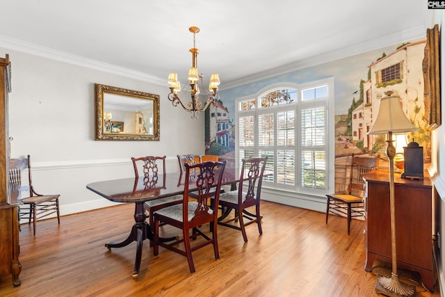 411 Turkey Point Cir, Columbia, SC 29223 - dining space with wood finished floors, an inviting chandelier, and crown molding