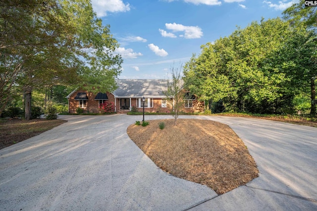 370 Chapel Creek Dr, Santee, SC 29142 - single story home featuring brick siding and curved driveway