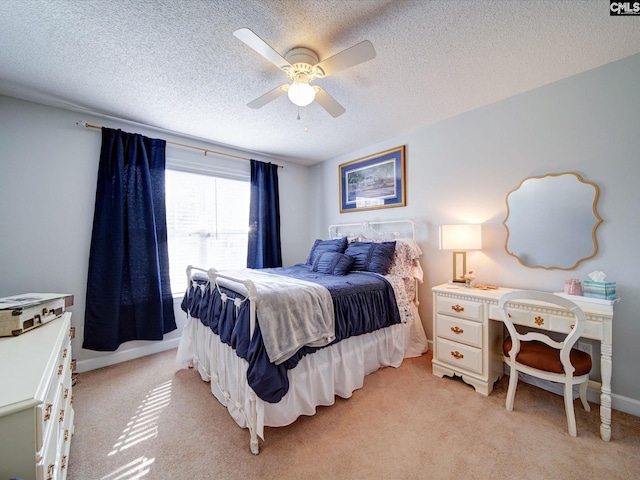 78 Southern Oak Dr, Camden, SC 29020 - bedroom featuring light colored carpet, ceiling fan, baseboards, and a textured ceiling
