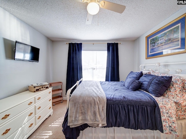 78 Southern Oak Dr, Camden, SC 29020 - bedroom with a ceiling fan, a textured ceiling, and light colored carpet