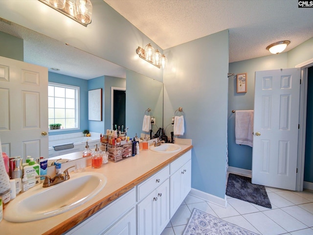 78 Southern Oak Dr, Camden, SC 29020 - full bath featuring tile patterned floors, a sink, and a textured ceiling