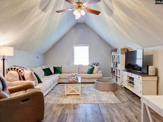 78 Southern Oak Dr, Camden, SC 29020 - living room featuring wood finished floors, a textured ceiling, lofted ceiling, and ceiling fan