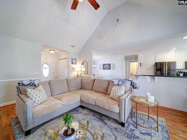 78 Southern Oak Dr, Camden, SC 29020 - living area featuring visible vents, wood finished floors, high vaulted ceiling, and ceiling fan