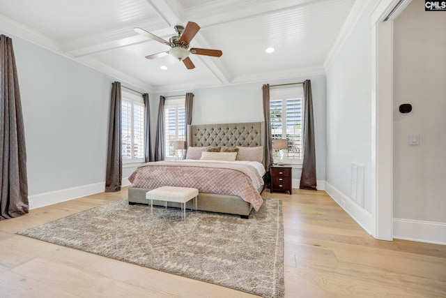 bedroom with baseboards, multiple windows, and coffered ceiling