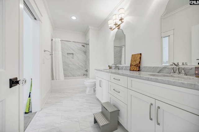bathroom with marble finish floor, ornamental molding, a sink, and double vanity