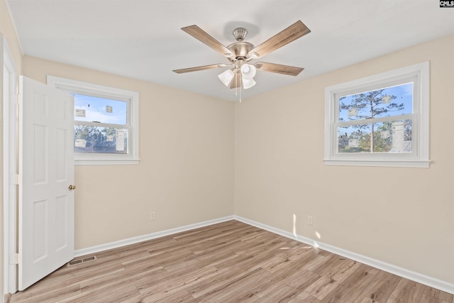 1015 Mandel Dr, Columbia, SC 29210 - spare room with light wood-type flooring, visible vents, baseboards, and plenty of natural light