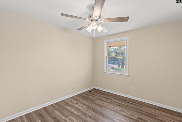 1015 Mandel Dr, Columbia, SC 29210 - spare room with baseboards, wood finished floors, and ceiling fan