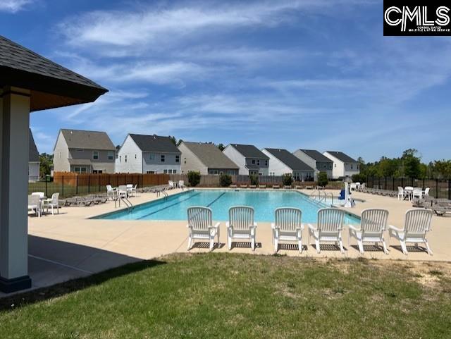 1104 Turtle Stone Rd, Blythewood, SC 29016 - pool featuring fence, a patio area, a yard, and a residential view