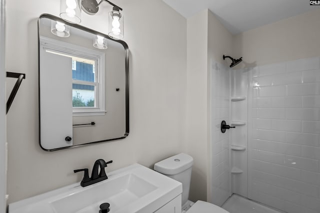 full bathroom with walk in shower, toilet, and vanity