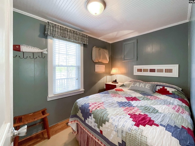 bedroom with crown molding
