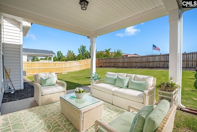 view of patio / terrace featuring a fenced backyard and outdoor lounge area