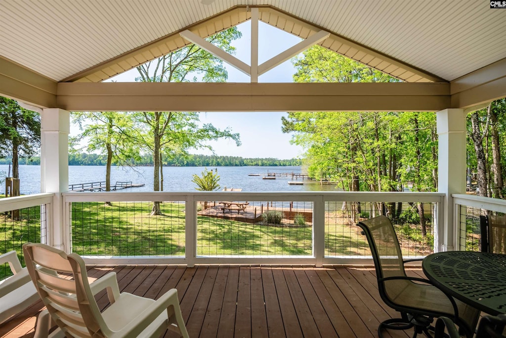 146 Kims Cv, Prosperity, SC 29127 - sunroom featuring vaulted ceiling, a water view, and wood-type flooring