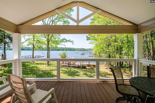 146 Kims Cv, Prosperity, SC 29127 - sunroom featuring vaulted ceiling, a water view, and wood-type flooring