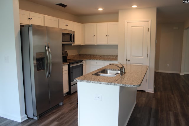 518 Cricket Chirp Ln, Elgin, SC 29045 - kitchen featuring appliances with stainless steel finishes, a sink, white cabinetry, light stone countertops, and recessed lighting