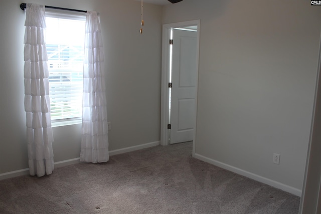 518 Cricket Chirp Ln, Elgin, SC 29045 - carpeted spare room with baseboards and a ceiling fan