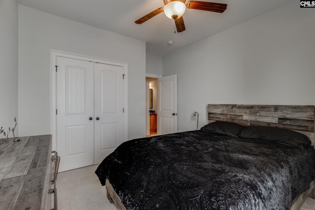 bedroom featuring a closet, a ceiling fan, and light carpet