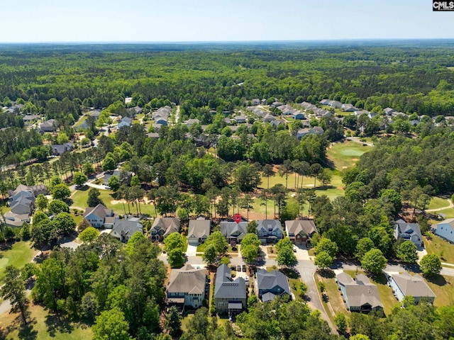 bird's eye view with a residential view and a view of trees