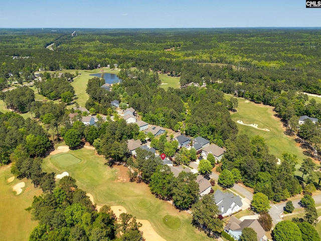 bird's eye view featuring view of golf course, a water view, a residential view, and a wooded view
