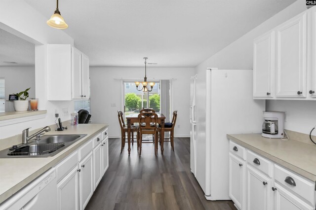 520 Blue Lake Dr, Lexington, SC 29072 - kitchen featuring dark wood-style flooring, a sink, white appliances, and light countertops