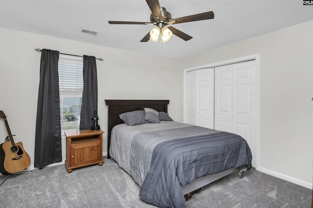 520 Blue Lake Dr, Lexington, SC 29072 - bedroom with light carpet, a textured ceiling, visible vents, and a closet