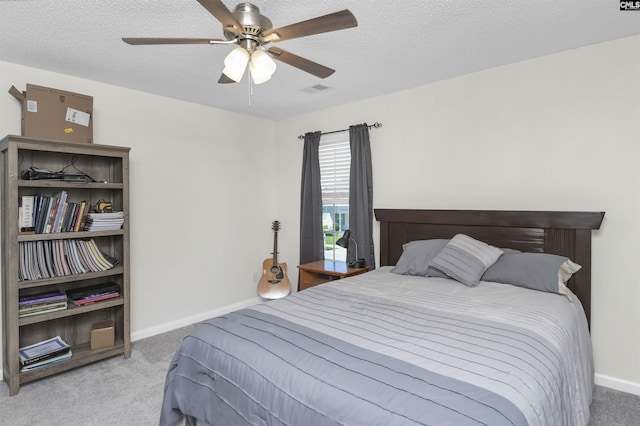 520 Blue Lake Dr, Lexington, SC 29072 - carpeted bedroom with baseboards, a ceiling fan, a textured ceiling, and visible vents
