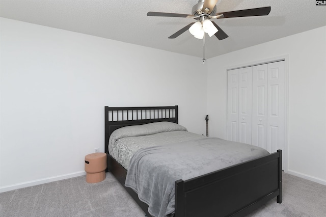 520 Blue Lake Dr, Lexington, SC 29072 - bedroom featuring baseboards, light carpet, a ceiling fan, and a closet