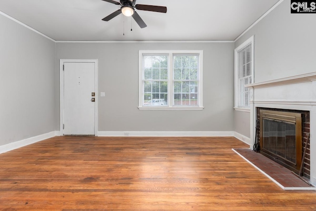 3428 Rosewood Dr, Columbia, SC 29205 - unfurnished living room featuring wood finished floors, a ceiling fan, crown molding, baseboards, and a fireplace