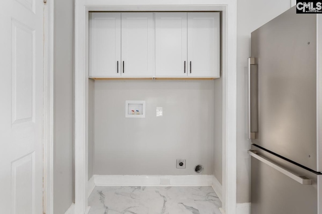 3428 Rosewood Dr, Columbia, SC 29205 - clothes washing area featuring electric dryer hookup, baseboards, washer hookup, and cabinet space