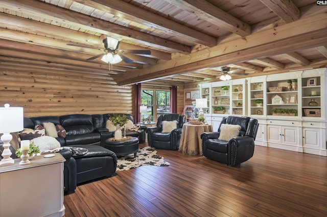 living area featuring beam ceiling, a ceiling fan, dark wood-style floors, and wood ceiling