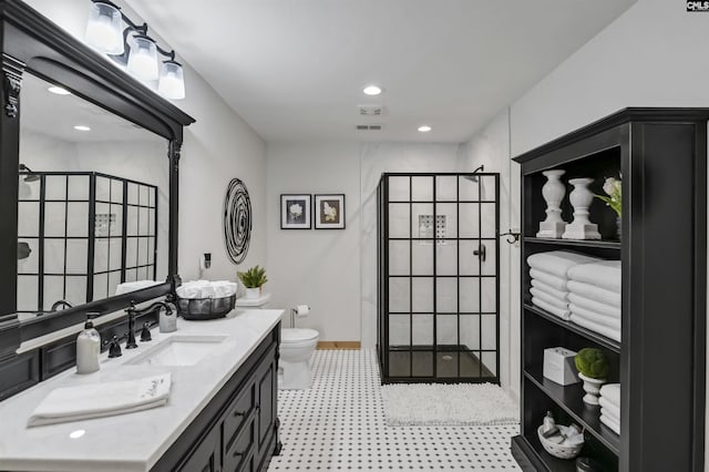 bathroom featuring a shower stall, visible vents, toilet, and vanity