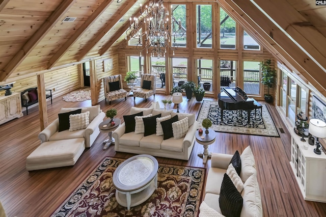 living area featuring high vaulted ceiling, a notable chandelier, wood finished floors, and beamed ceiling