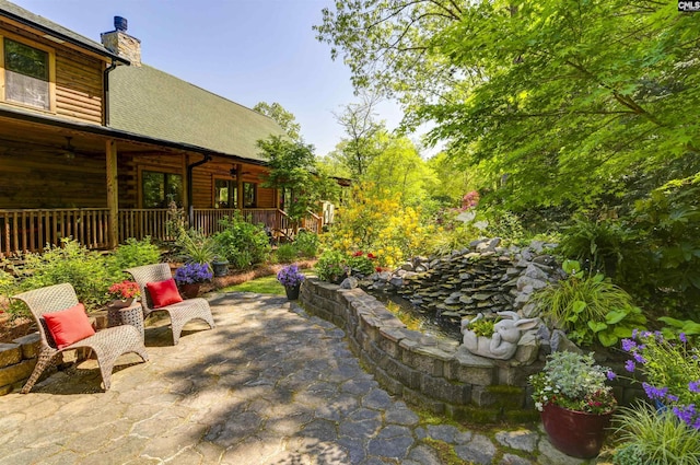 view of patio / terrace featuring a ceiling fan