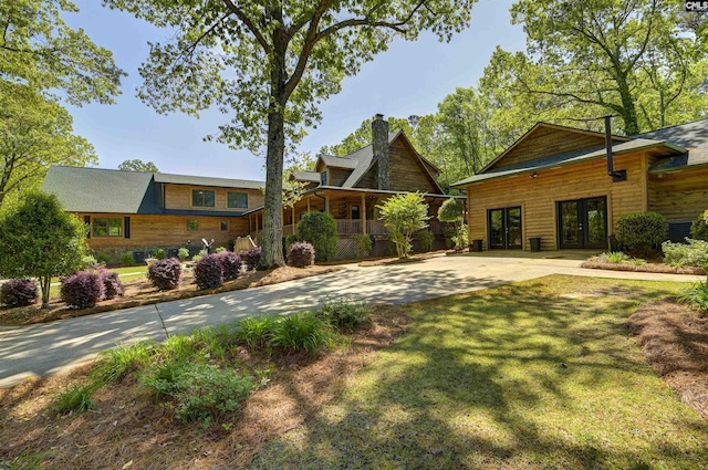 view of yard with french doors