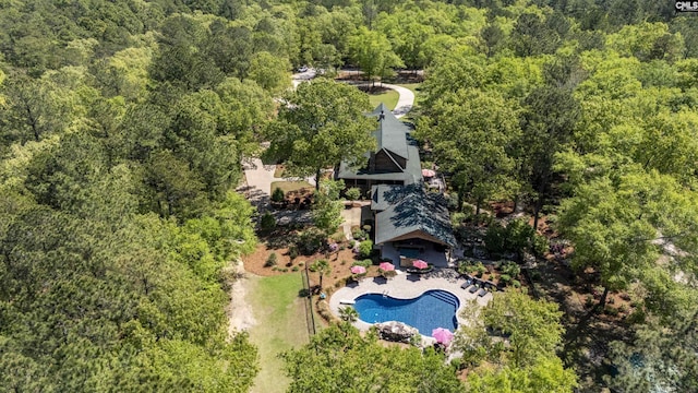 drone / aerial view with a view of trees