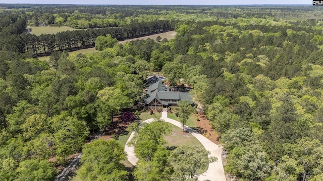 bird's eye view with a view of trees
