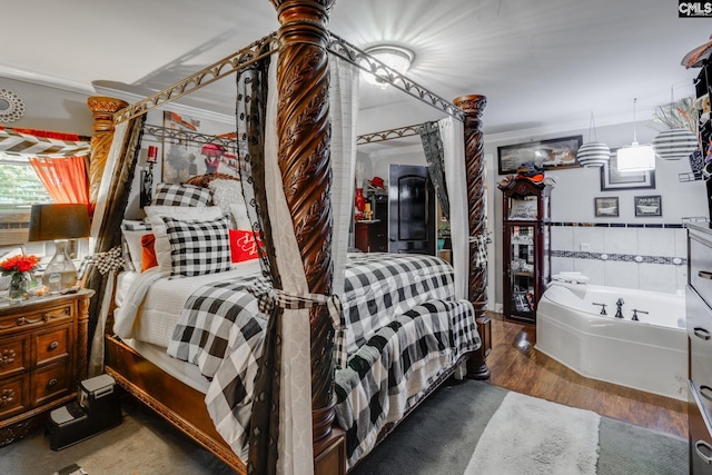 bedroom featuring wood finished floors and ornamental molding