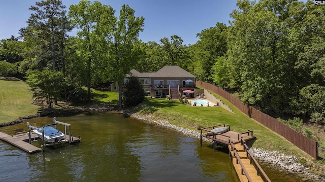 1305 Rock Island Rd, Gilbert, SC 29054 - dock area with a deck with water view, boat lift, fence, a lawn, and stairs
