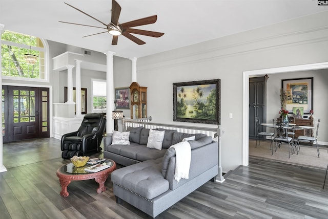 1305 Rock Island Rd, Gilbert, SC 29054 - living room featuring a ceiling fan, wood finished floors, and decorative columns